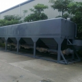 Semi trailer mounted low level box silo for cement or fly ash storage